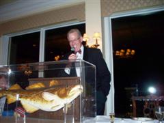 Torskemaster Dick Johnson, NBC 5 News Anchor and Reporter admires Barney the Cod